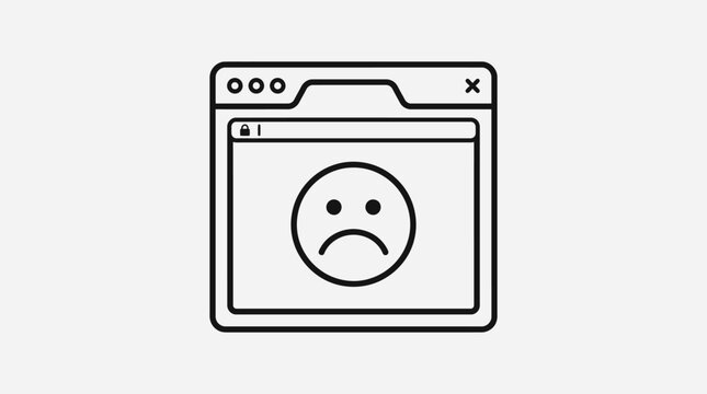 Sad face emoticon on computer screen.