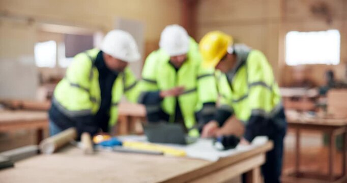 Laptop, blur and architecture with people in workshop for renovation team, project and planning. Engineer, collaboration and online blueprint with contractor in warehouse for construction review