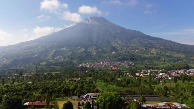 Aerial drone footage showcasing the majestic landscape of Mount Sumbing, an active stratovolcano and the second-highest volcano in Central Java, Indonesia.