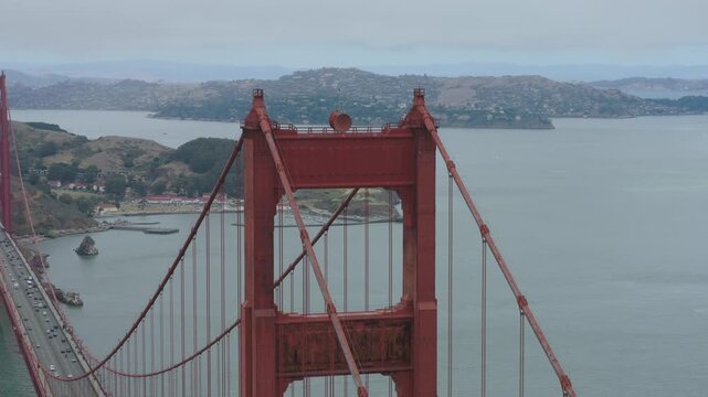 Top Of Golden Gate Bridge Tower - Aerial Shot Of Marin Headlands With Overcast