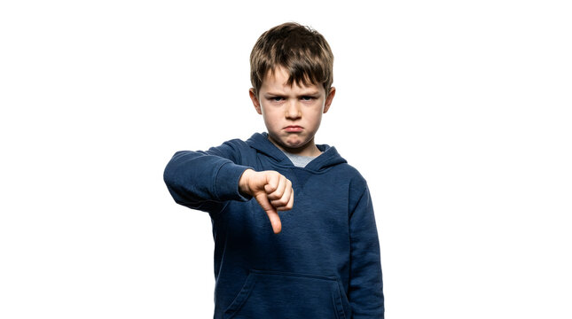 Young boy with unhappy expression giving thumbs down gesture PNG Isolated on transparent background