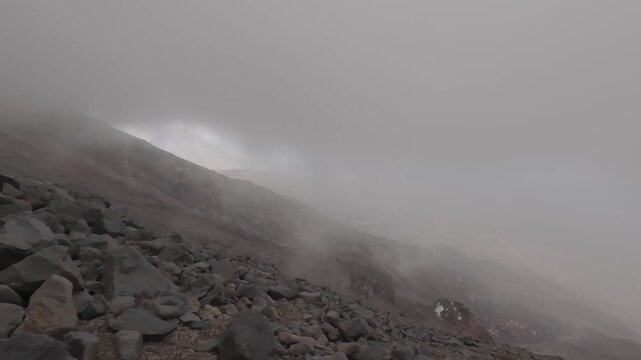 View of Mount Little Ararat from the slope of Mount Greater Ararat in fog and bad weather Turkey