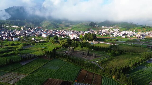 Aerial Drone View of Arjuna Temple Complex at Dieng Plateau, Indonesia During Golden Hour