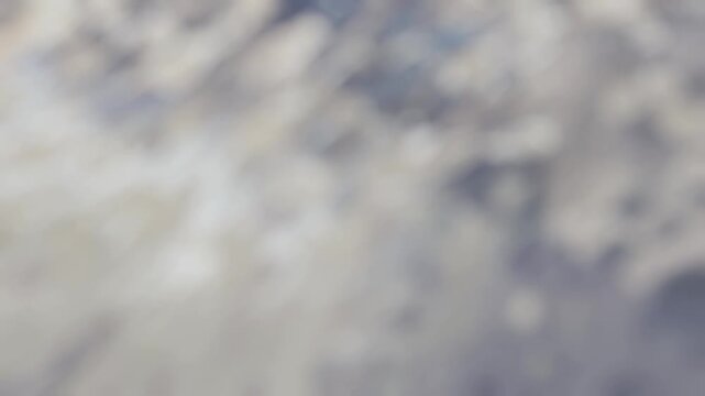 Abstract blurred white clouds on grey background, dreamy soft defocus texture