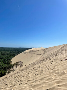 Dune of Pilat panoramic Atlantic coast view over Arcachon Bay under summer clouds, France