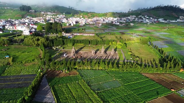 Aerial Drone View of Arjuna Temple Complex at Dieng Plateau, Indonesia During Golden Hour