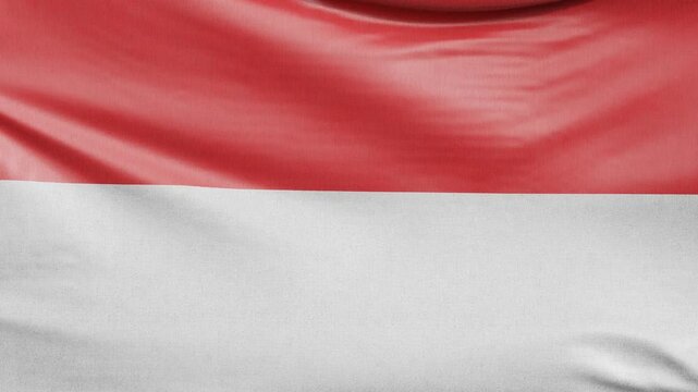 Rolling clockwise across Indonesian flag waving in wind national pride