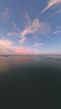 Vertical Drone Video of Sunset Over Dunedin Causeway and Saint Joseph Sound, Florida