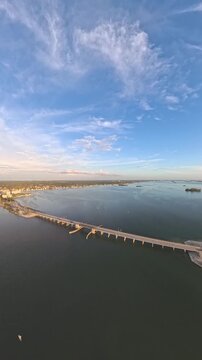 Vertical Drone Video of Sunset Over Dunedin Causeway and Saint Joseph Sound, Florida