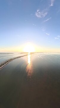 Vertical Drone Video of Sunset Over Dunedin Causeway and Saint Joseph Sound, Florida