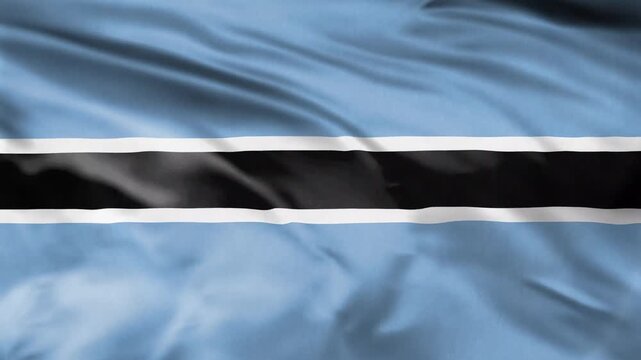 Botswana flag waving gently in wind seamless loop national ensign.
