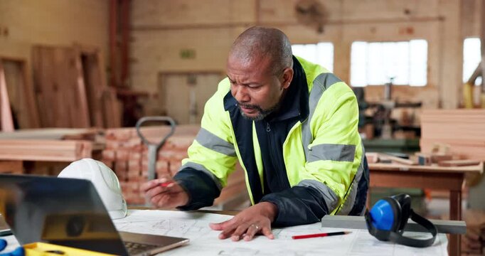 Architect, thinking or black man with blueprint for construction development or architecture design. Male person, mature contractor or writing with laptop or documents for building plan in workshop