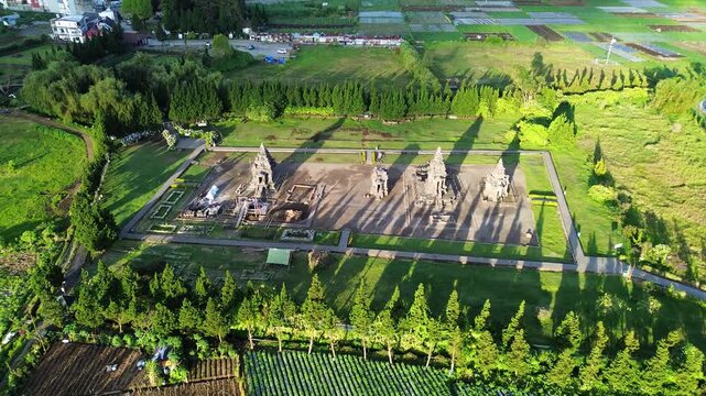 Aerial Drone View of Arjuna Temple Complex at Dieng Plateau, Indonesia During Golden Hour