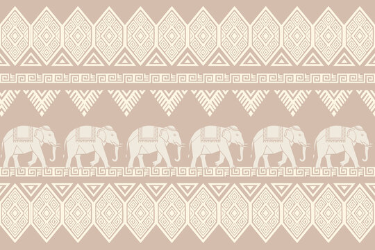 Thai elephant seamless pattern with traditional geometric ikat ornaments on pastel background. Vector illustration.