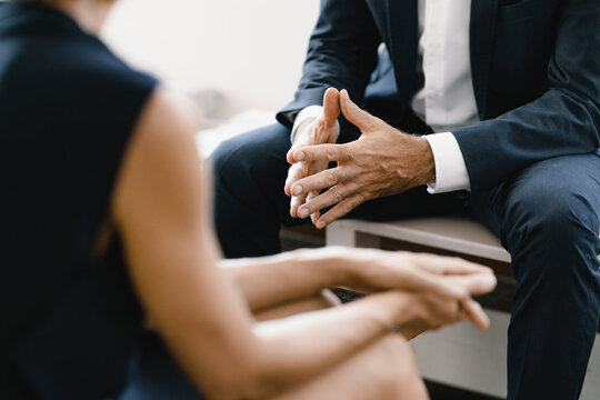 Business people having a meeting, close up of hands