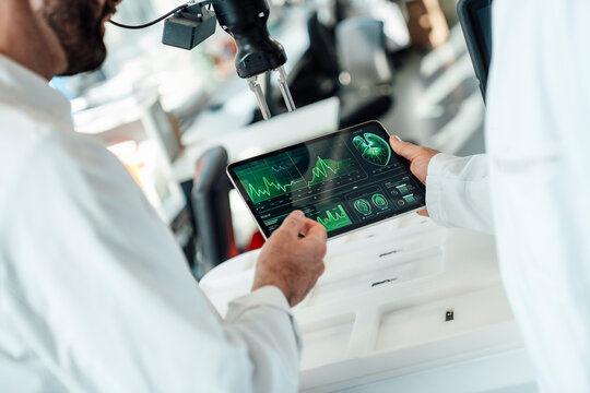 Medical research and evaluation on a tablet in a science laboratory