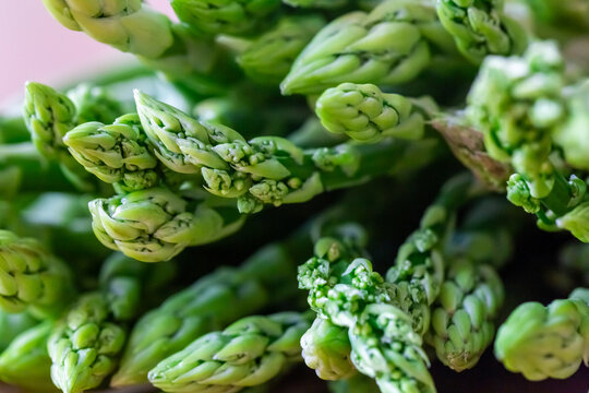 Macro close up of fresh green asparagus tips