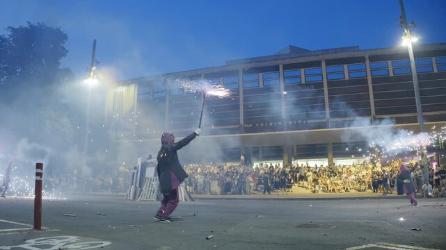a fire festival in the street to celebrate sant Joan on mid summer night in barelona