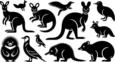 Naklejka premium Black silhouettes of various Australian animals on white background