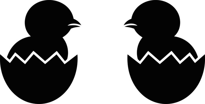 Two black silhouettes of chicks hatching from eggs side by side on white background