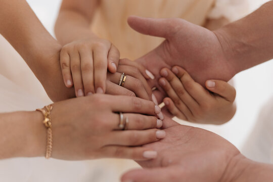 Family hands joining together in unity