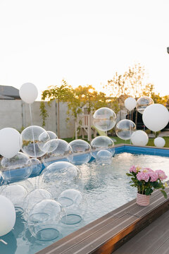 Floating transparent bubbles in swimming pool decoration