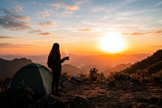Generated ai Solitary Hiker Watches Stunning Mountain Sunrise from Tent Site