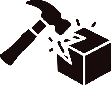 Black silhouette of hammer hitting and breaking a box with debris flying around it