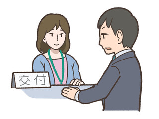 Obraz premium 役所の窓口で書類の手続きをする男性