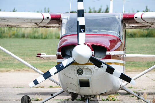 Corby, United Kingdom &ndash; July 1, 2026: Light aircraft parked beside hangar at a small airfield, editorial