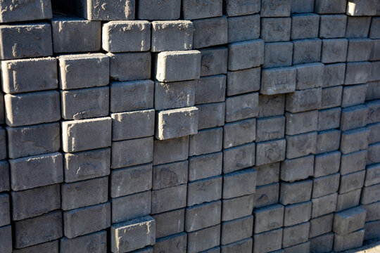 Bricks stacked neatly at the morning site