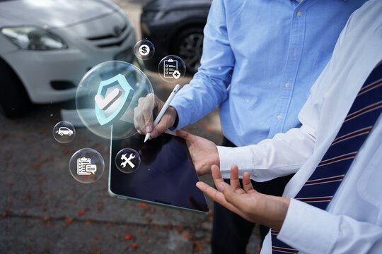 Car insurance: The concept of vehicle protection. Two people are discussing car insurance, the financial protection it provides for a covered vehicle.