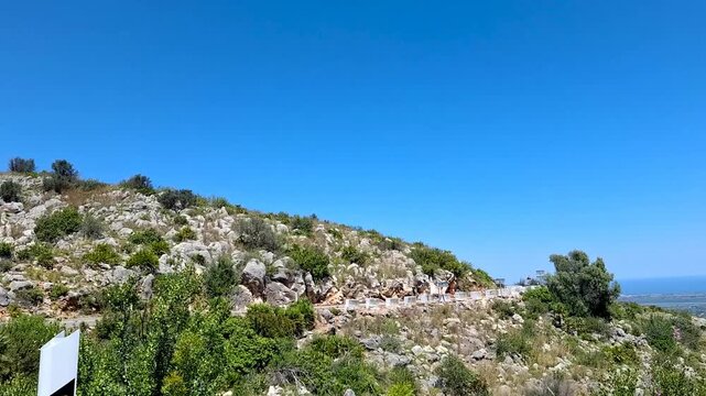 Slow motion view of a dangerous mountain serpentine road at Puerto de la Vall de Ebo in Spain