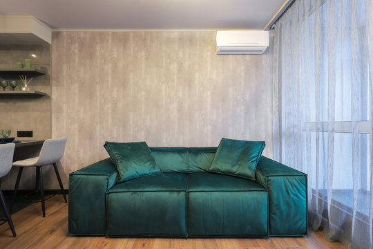 Sofa in the studio room interior