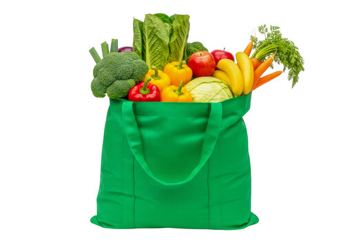 Bright green reusable shopping bag filled with fresh fruits and vegetables isolated on transparent background