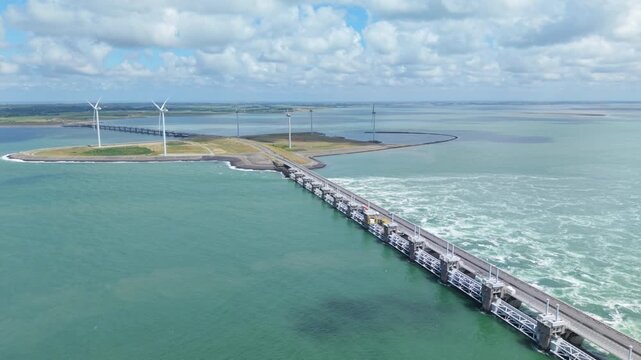 Eastern Scheldt storm surge barrier with renewable wind energy turbines in Zeeland, Netherlands