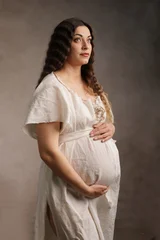 Artistic Maternity Portrait of Pregnant Woman in Medieval Gown © zea_lenanet