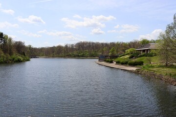 Fototapeta premium The peaceful countryside lake on a sunny day.
