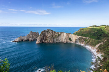 Fototapeta premium Coastal Landscape with Rocky Cliffs and Bay. Silencio beach in Cudillero, Asturias, Spain