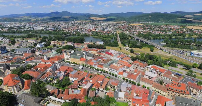 4k locked down motion high angle panoramic view of the city of Trencin, view taken from the Trencin Castle with Peace Square in foreground which is the historic heart of the city, Trencin, Slovakia