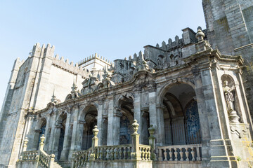 Fototapeta premium Stone Building Facade With Arched Colonnade and Ornamental Details
