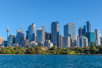 Fototapeta premium 2 July 2026 View of Sydney central Business District CBD residential and commercial high rise office towers viewed from Botanical Gardens on the harbour foreshore in Sydney NSW Australia