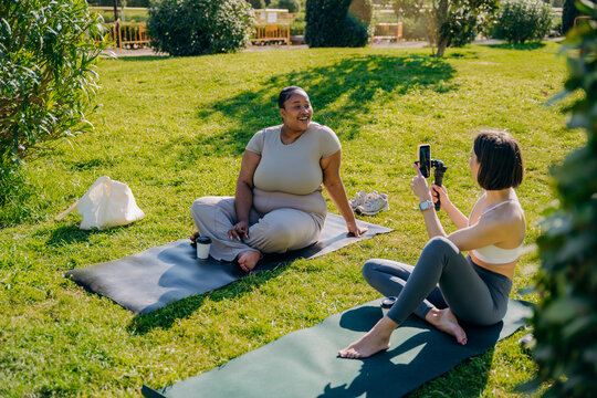 Two women relaxing after a workout