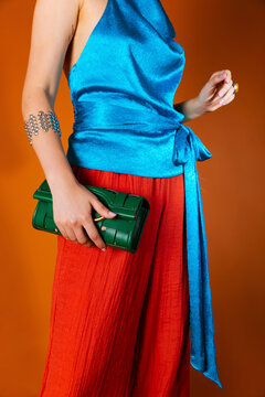 Woman wearing vibrant blue top 