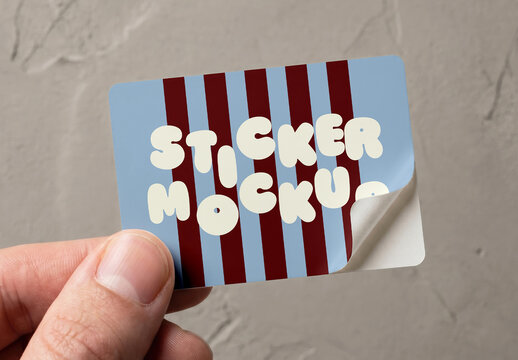 Rectangle Sticker Mockup on Laptop Back on Wooden Desk