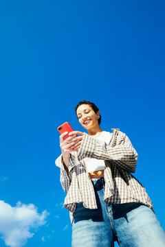 Woman Using Smartphone Outdoors