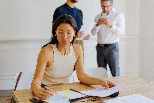 Professional concentrating while planning and organizing business