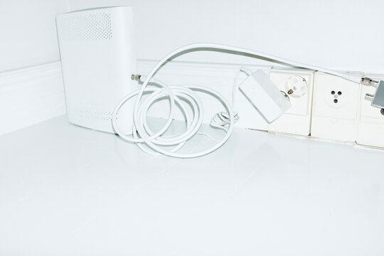 View of technology devices and wires chargers in living room