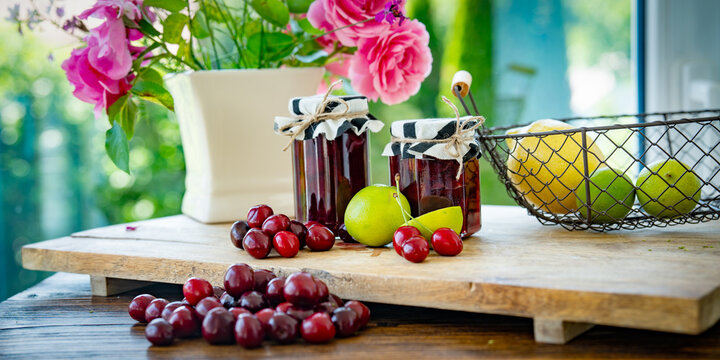 Red cherries for homemade jam. Background for preserving seasonal fruit.