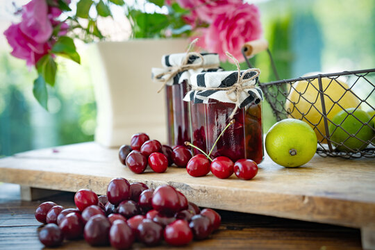 Red cherries for homemade jam. Background for preserving seasonal fruit.